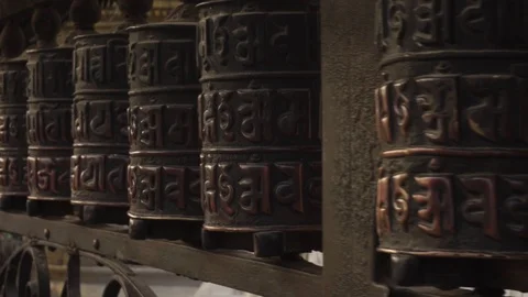 Nepal- spinning prayer wheels Stock Footage 104342511
