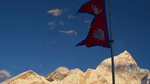 Nepalese flag wave by Kala Pathhar viewpoint.Sagarmatha national park. Ever.. Stock Footage 277400505