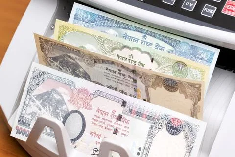 Nepalese rupee in the counting machine Stock Photos