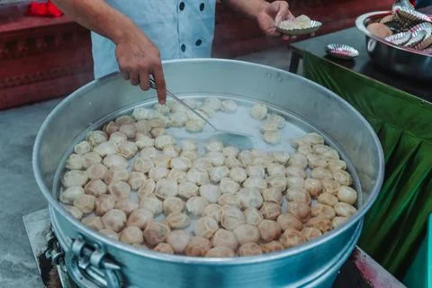 Nepalese steamed dumpling momo serving at the party. Close up image. Foto stock