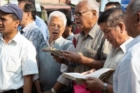 Nepali Men Offering Prayers Stock Photos