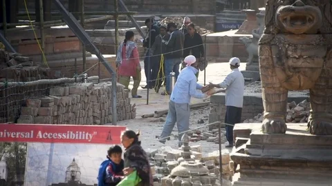 Nepali Stacking Bricks At Local Temple Earthquake Repair 2 year later Stock Footage 80708529