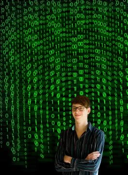 Nerd computer businessman on matrix binary background Stock Photos