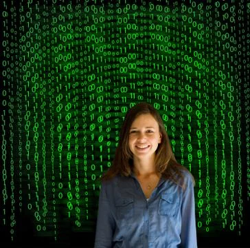 Nerd computer businesswoman on matrix binary background Foto stock
