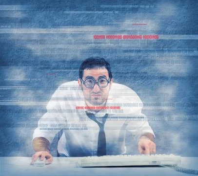 Nerd computer programmer works on a virus program 写真素材