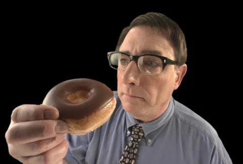 Nerd Eating Donut Stock Footage 754267