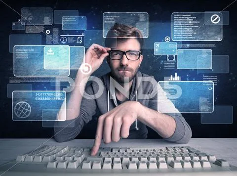 Nerd with glasses hacking websites Stock Photos