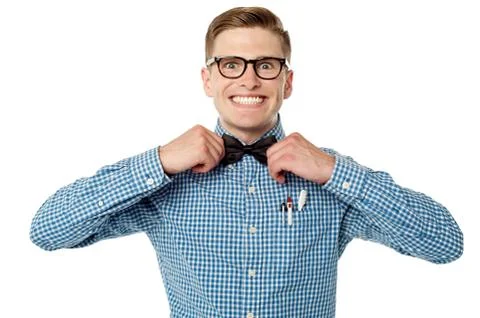 Nerd guy adjusting his bow tie Stock Photos