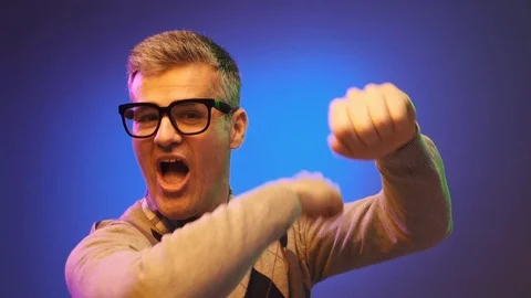 Nerd guy with glasses dancing and having fun Video stock 90642718