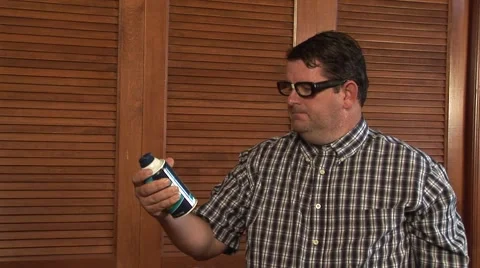 Nerd man with product, shave cream. Stock Footage 49110448