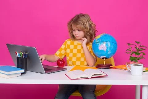 Nerd pupil. Clever child from elementary school with book. Smart genius Stock Photos