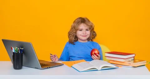 Nerd school kid isolated on studio background. Clever child from elementary Stock Photos