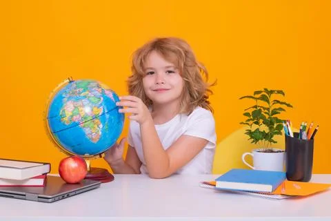 Nerd school kid isolated on studio background. Clever child from elementary Stock Photos
