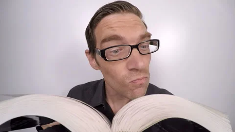 Nerd student reading Stock Footage 210528136