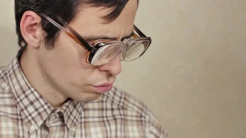 Nerd wearing two pair of glasses Stock Video Pond5