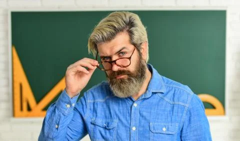 Nerdy bearded student. back to school. develop logic and creativity. start the Stock Photos
