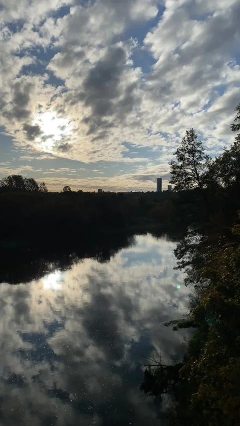 Neris river in backlight, Vilnius, Lithuania. Vertical video Stock Footage 253390434