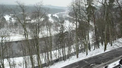 Neris river flow floe and small road downhill car passing Stock Footage 20430507