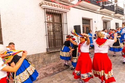 NERJA, SPAIN - MAY 04, 2018  folk dance show by a group of people on the stre Stock Photos