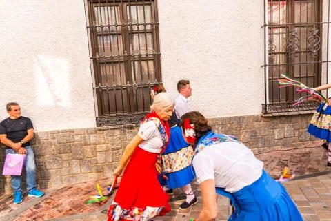 NERJA, SPAIN - MAY 04, 2018  folk dance show by a group of people on the stre Stock Photos