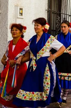 NERJA, SPAIN - MAY 04, 2018  folk dance show by a group of people on the stre Stock Photos