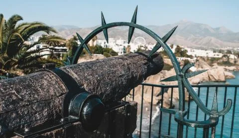 Nerja / Spain - October 2019: Close up view of a carved heavy old Spanish cannon Stock Photos