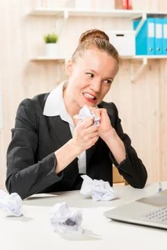 Nervous accountant made a errors in the documents and destroy them Stockfoto's