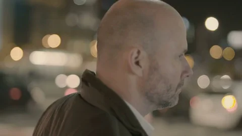 Nervous Bald Man Walking Around and Touching his Cheek Stock Footage 81458839