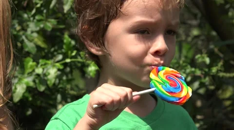Nervous Boy Eating Candy Video stock 61360082