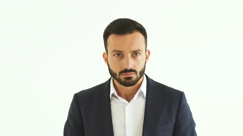 The nervous businessman gesturing on the white background Stock Footage 100751780