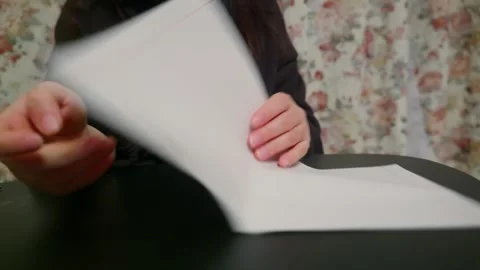 Nervous Hands Fidgeting with Paper Stock Footage 332450252