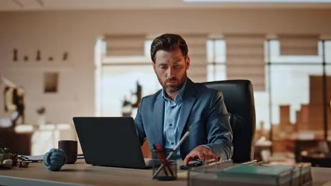 Nervous man answering call at computer desk workplace. Businessman screaming Stock Photos