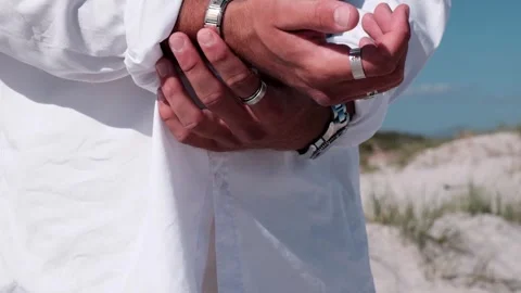 Nervous man hands playing and fidgeting with rings and bangles Stock Footage 241219286