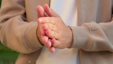Nervous man rubbing hands together.  Close up of a person rubbing their han.. Stock Footage 339547250