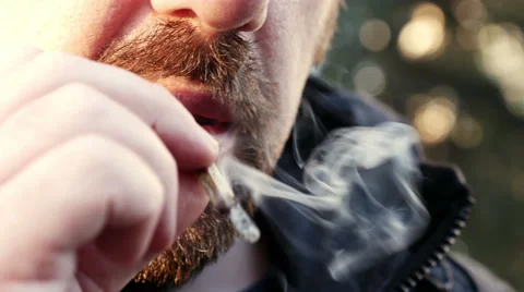 Nervous Man Smoking Stock Footage 64952460