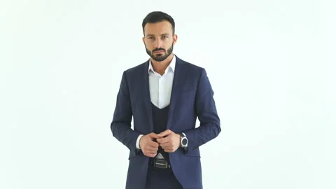 The nervous man standing on the white background Stock Footage 100748336