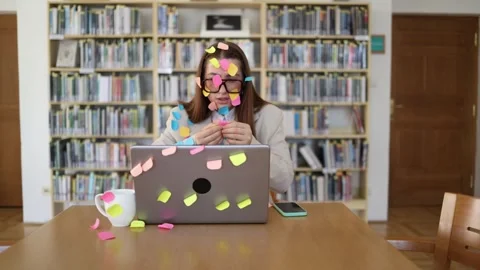 Nervous office worker with sticky notes worries she cannot finish all tasks on t Stock Footage 341657172