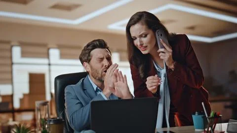 Nervous partners worried work problems at office closeup. Worried manager call Stock Photos