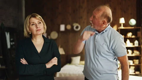Nervous senior man arguing with upset wife relationship crisis jealousy Stock Footage 329751610