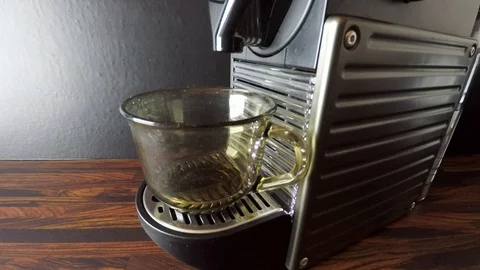 Nespresso Machine making fresh espresso in glass cup Stock Footage 123583742