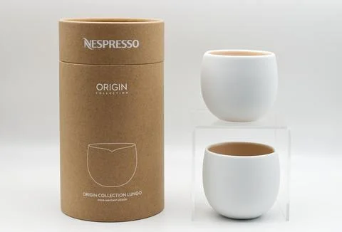 Nespresso origin collection lungo set isolated on white. Stock Photos