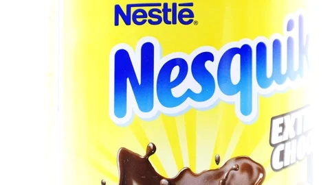 NESQUIK Extra Choco Powder. Nesquik is a brand of products made by Nestlé Stock Footage 114480260