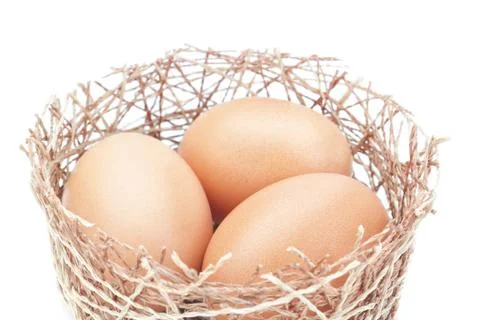Nest and a group of Easter eggs. On a white background. Stock Photos