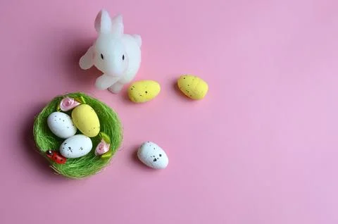 Nest of eggs and Easter bunny. Easter. Stock Photos