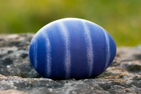 Nest of natural-colored Easter eggs Stock Photos