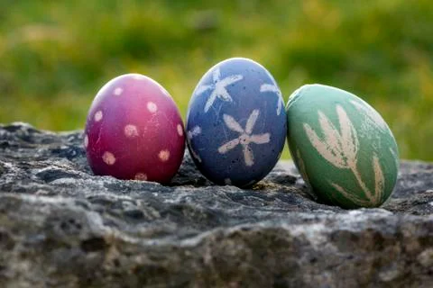 Nest of natural-colored Easter eggs Stock Photos