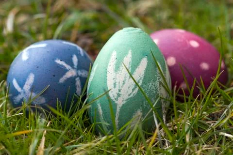 Nest of natural-colored Easter eggs Stock Photos