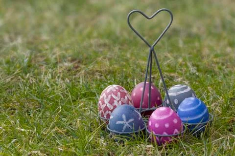Nest of natural-colored Easter eggs Stock Photos