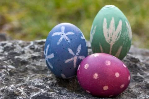 Nest of natural-colored Easter eggs Stock Photos