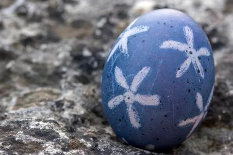 Nest of natural-colored Easter eggs Stock Photos